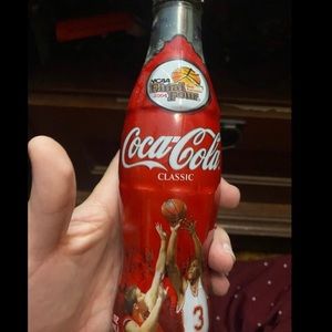 Two vintage coke bottles